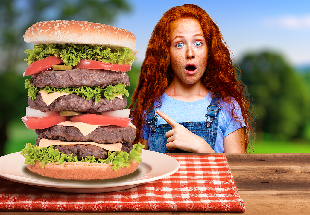 Girl with giant hamburger