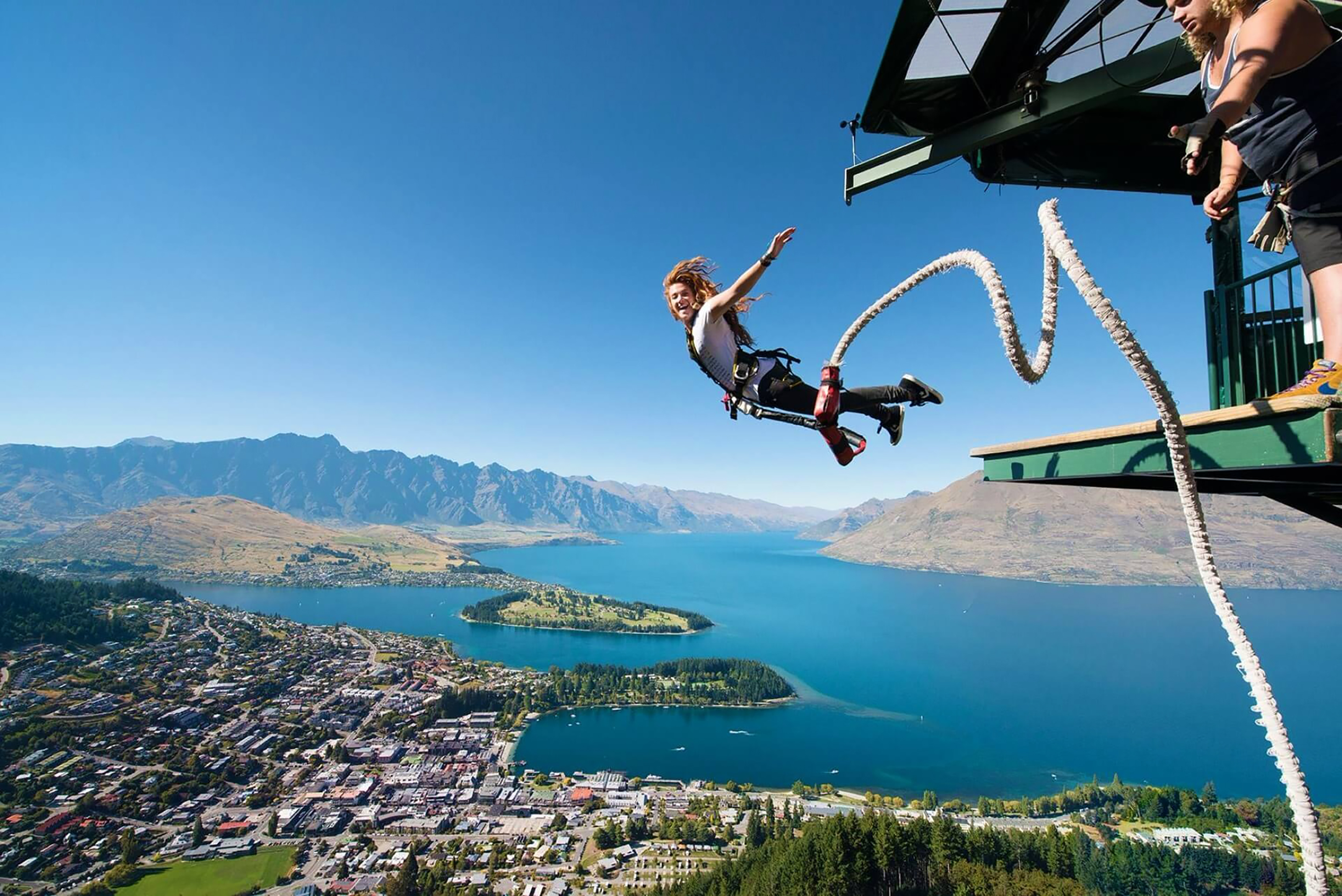 Lady Bungie jumping from a tower