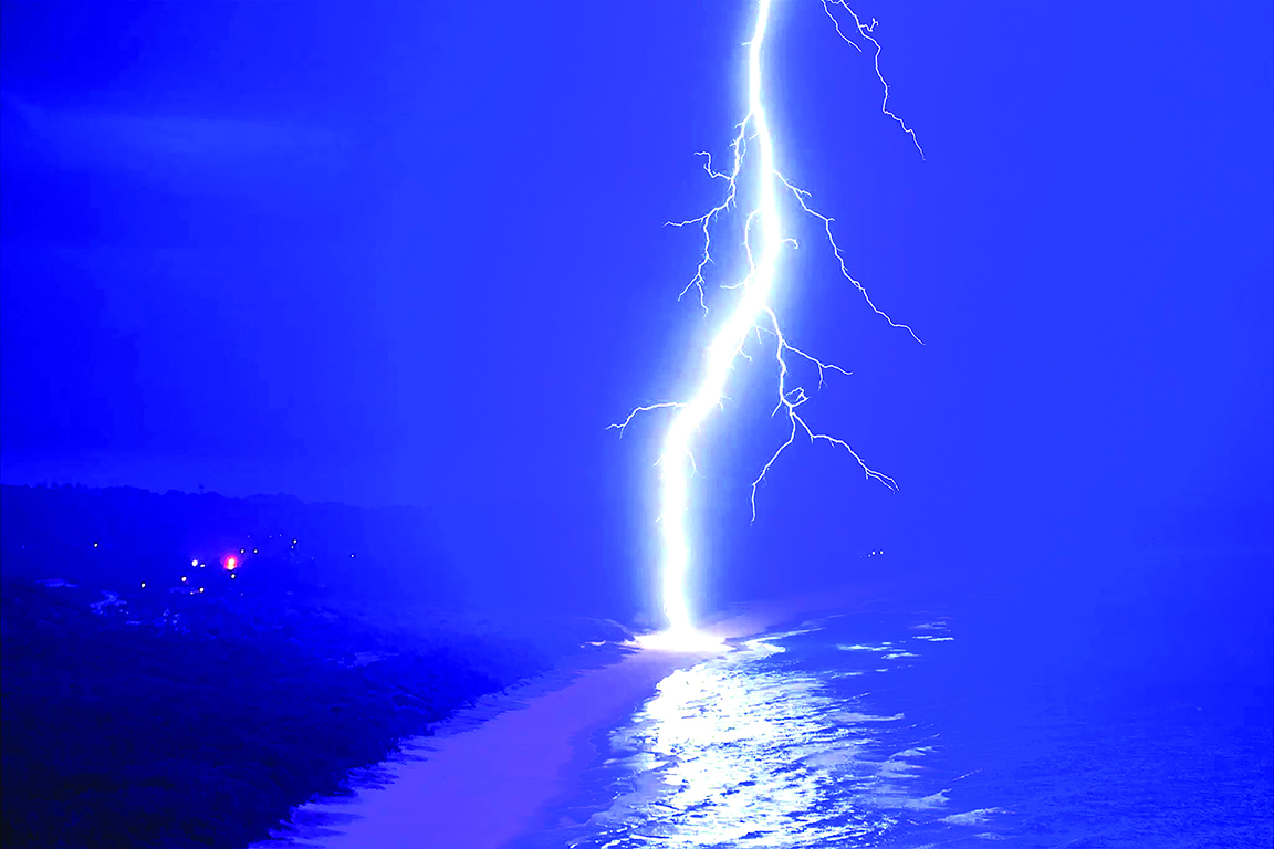 Lightning hitting the beach in Australia